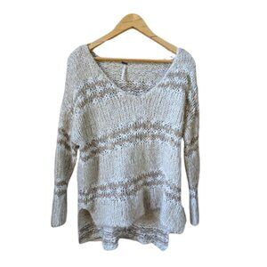 Free People over sized creme knitted sweater size S/M